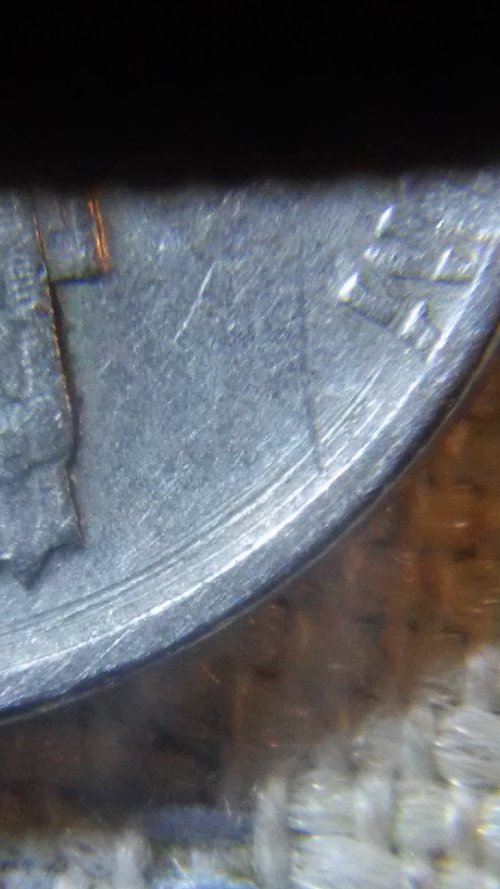 1971-D-Nickel-Has-A-Ring-Cut-Around-It-On-The-Reverse-Side